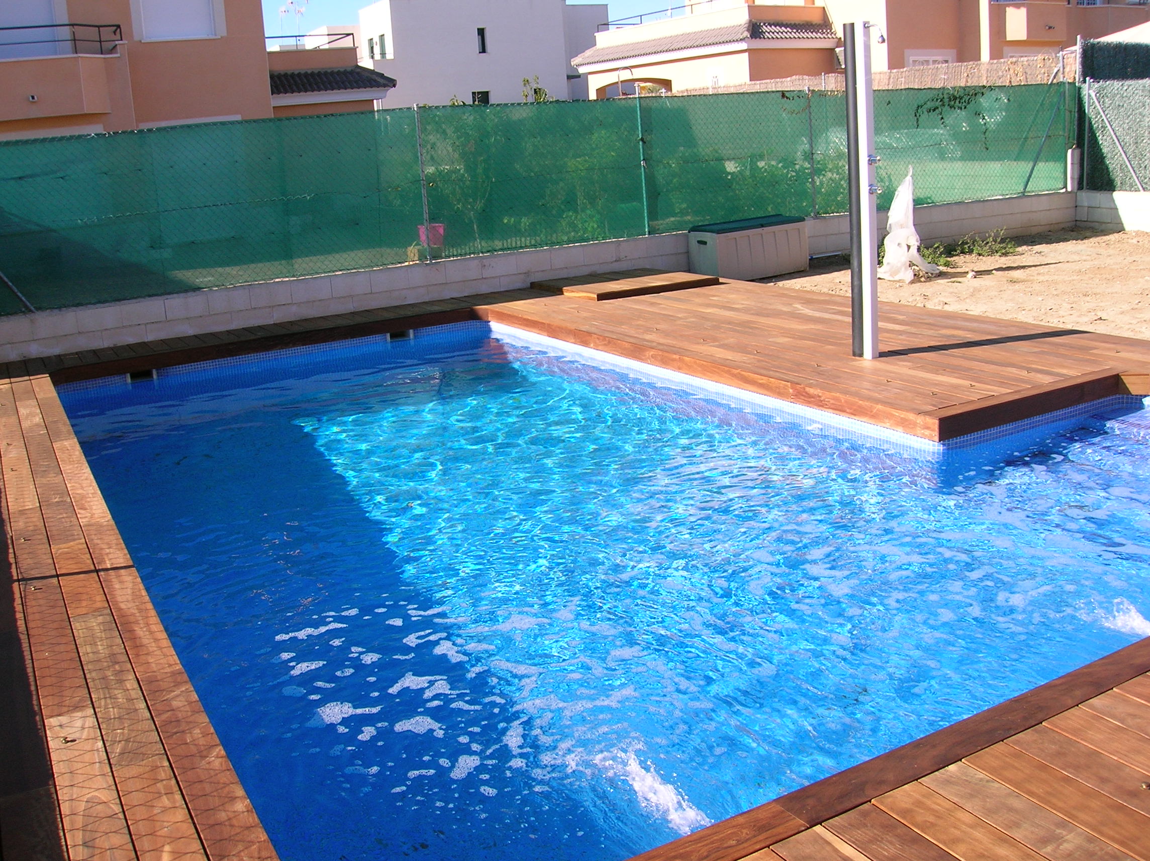 Piscina con tarima de ipe en paracuellos de Jarama Topmadera Piscina con tarima de ipe en paracuellos de Jarama Topmadera